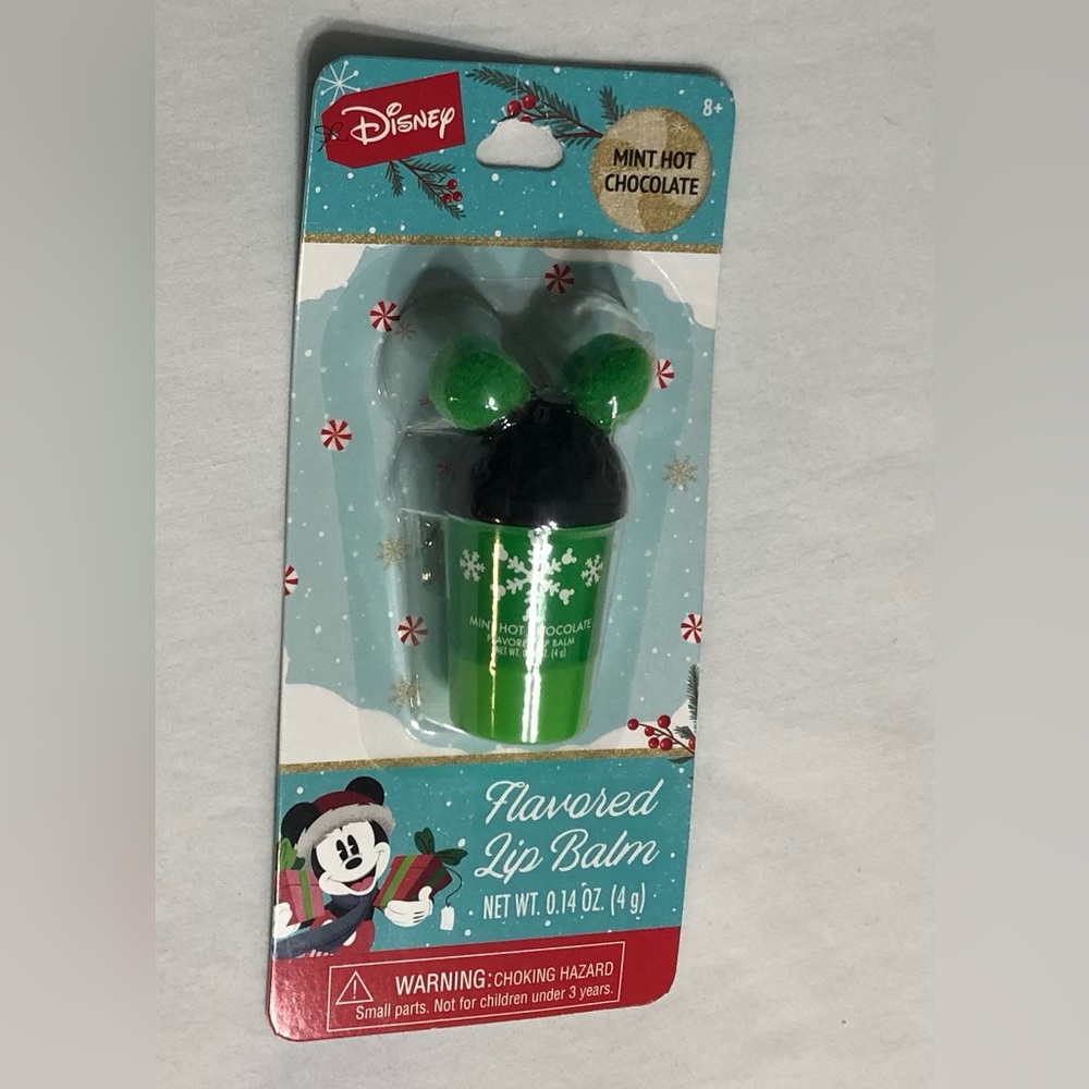 Disney Lip Balm Flavored Mint Hot Chocolate green snowflakes black. 0.14 Oz.